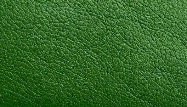 緑色のリアルな質感のレザーの背景の写真