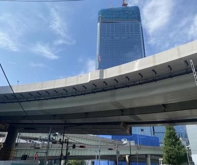 Photo, capital highway, multi-level crossing, skyscraper, 