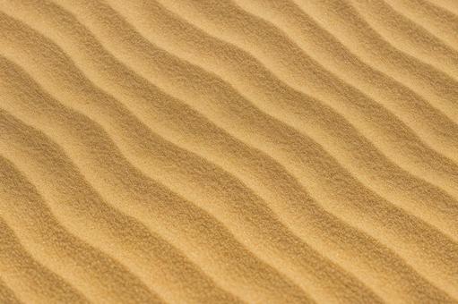 砂丘の砂紋・風紋が美しいナチュラルの背景 砂丘の砂紋・風紋が美しいナチュラルの背景の写真