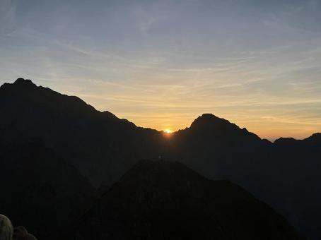 西穂高から奥穂高への縦走４　朝日 北アルプス,朝日,ご来光の写真素材