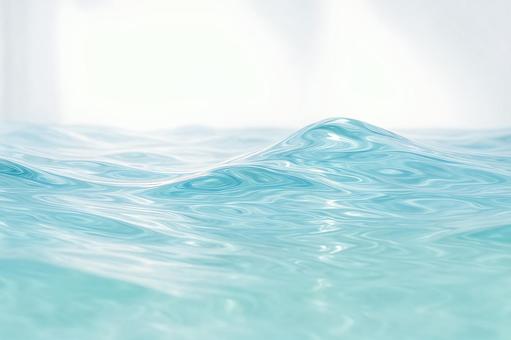 柔光に照らされた静かな波の質感の写真
