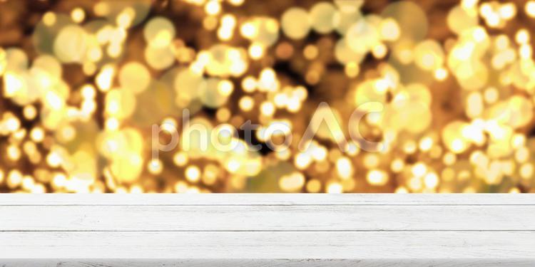 何もないテーブルとキラキラのイルミネーション テーブル,キラキラ,クリスマスの写真素材