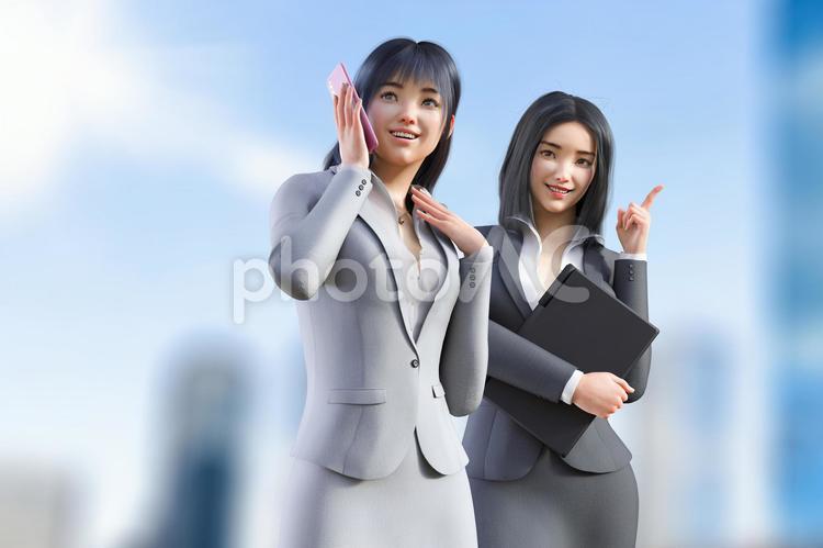 二人の女性営業マンがビジネス街を歩く 人物,ビジネス,女性の写真素材