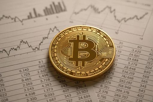 金融書類とビットコイン 金融書類とビットコインの写真