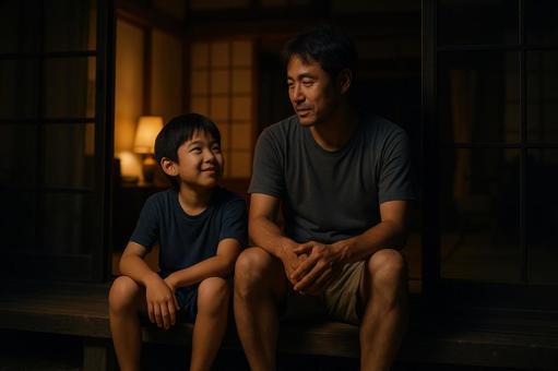 夏の縁側でくつろぐ親子 夏の縁側でくつろぐ親子の写真