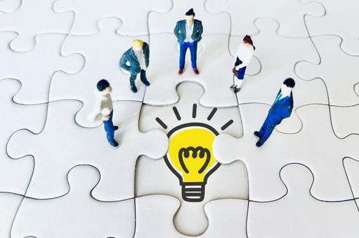 ジグソーパズルと電球とビジネスマン アイデア,電球,ひらめくの写真素材