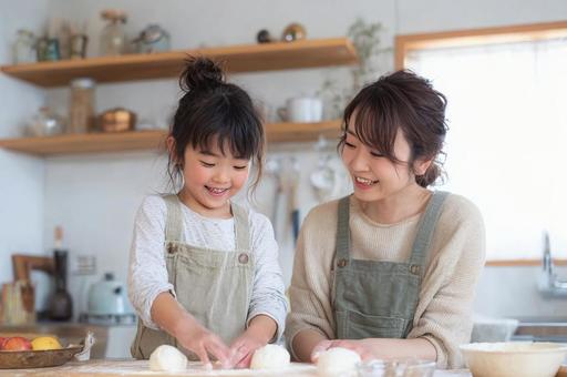 料理をする親子-3 料理をする親子-3の写真