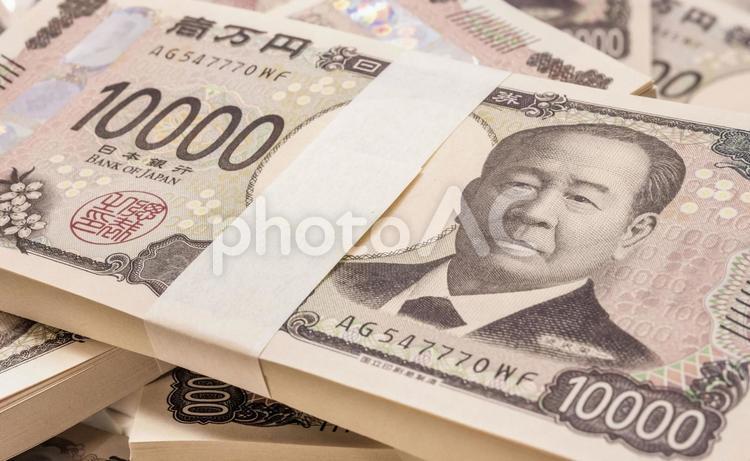 帯でまとめられた新一万円札 新紙幣,一万円札,一万円の写真素材