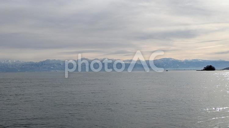 氷見の海から見た立山連峰 氷見,海,冬の写真素材
