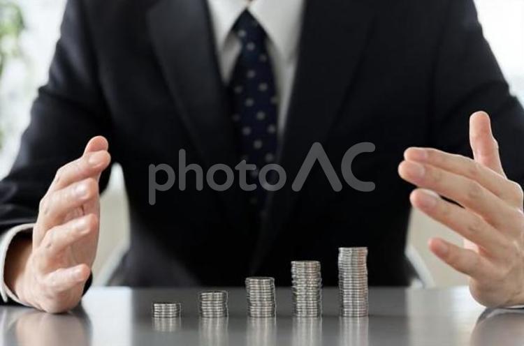 積み上がるお金のビジネスイメージ	 ビジネス,お金,硬貨の写真素材
