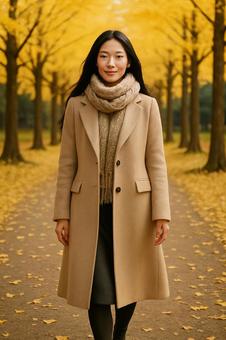 銀杏並木を歩く女性(全身・秋ファッション 銀杏並木を歩く女性(全身・秋ファッションの写真