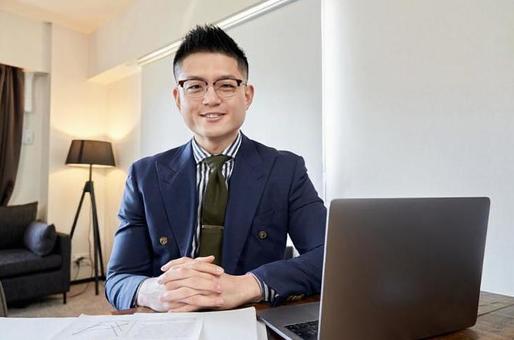 Asian male businessman having a remote meeting Asian male businessman having a remote meeting